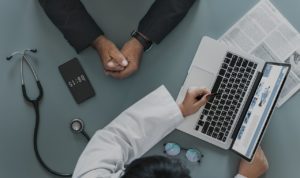 Doctor showing patient information