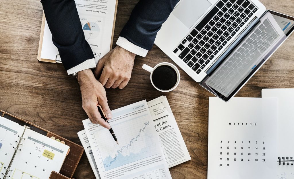 Business man looking at analytics
