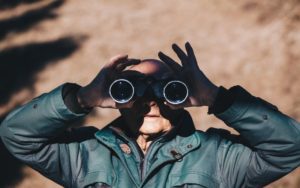 Man using binoculars