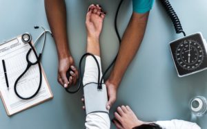 Nurse taking blood pressure