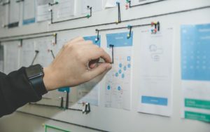 Guy pinning string on project layout