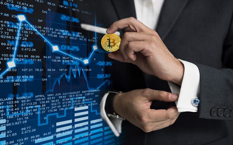 Business Man holding Bitcoin