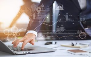 Business man in suit using laptop