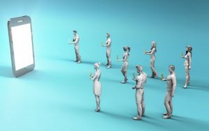 3D People standing around mobile phone