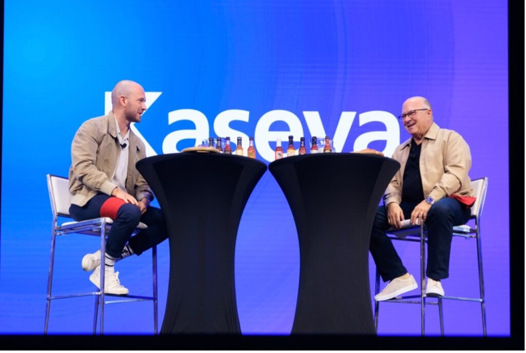 Seans Evans, Emmy-nominated host, conducts a “Hot Ones” style interview with Gary Pica, Chief Community Officer at Kaseya.